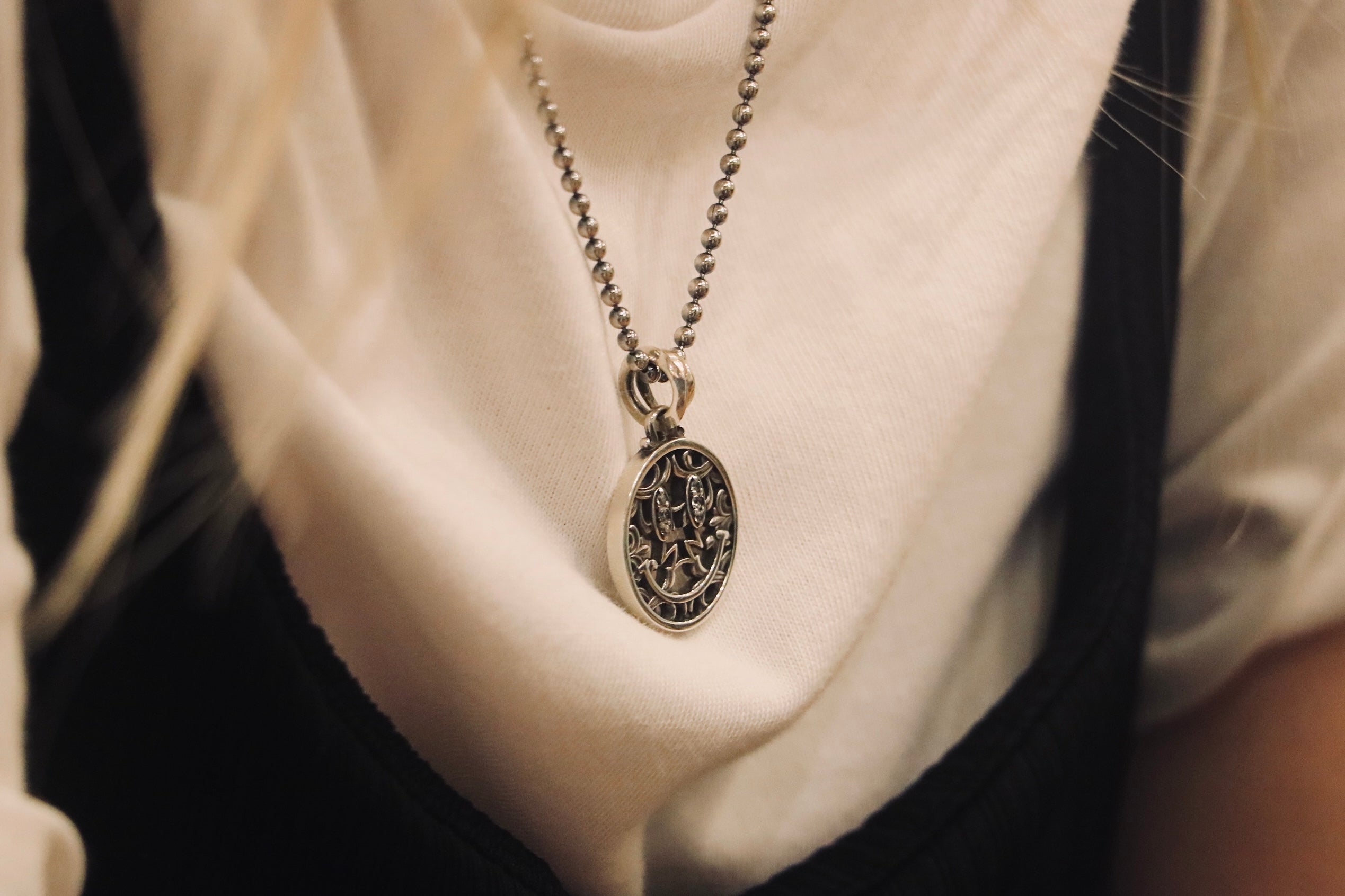 Flash Eye Smile Pendant