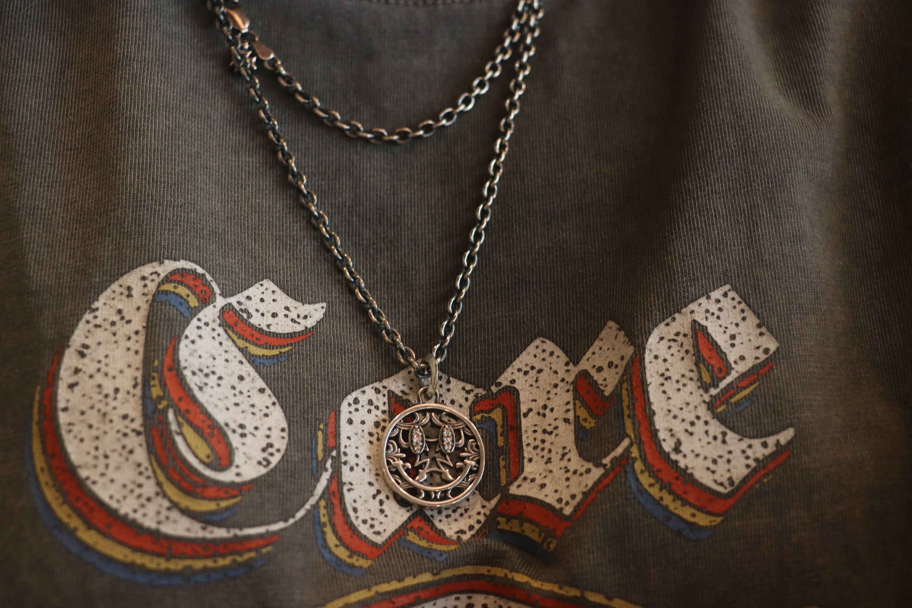 Flash Eye Smile Pendant
