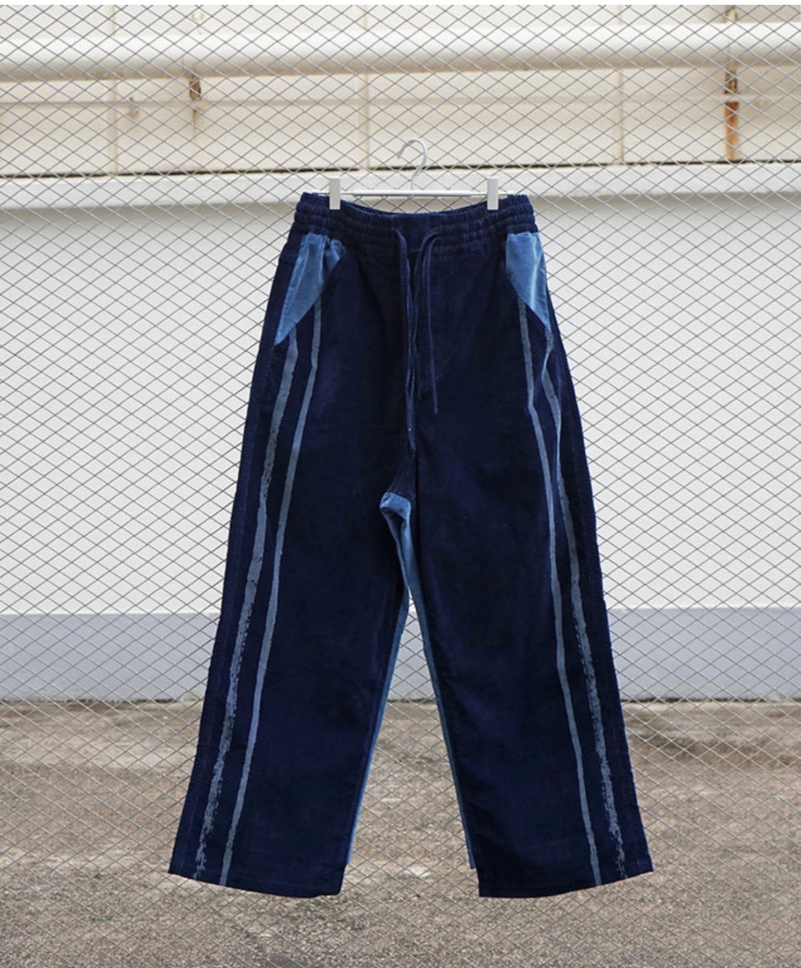 CALLIGRAPHY LASER PRINT DENIM VELVET DECONSTRUCTED TRACK-PANTS