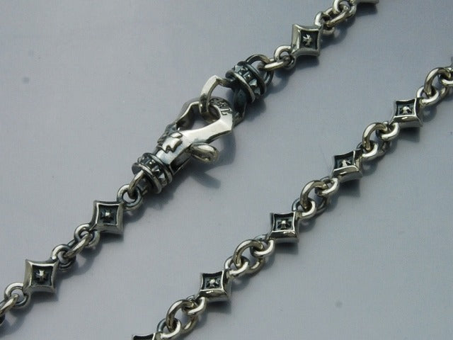 Tiny cross studs chain