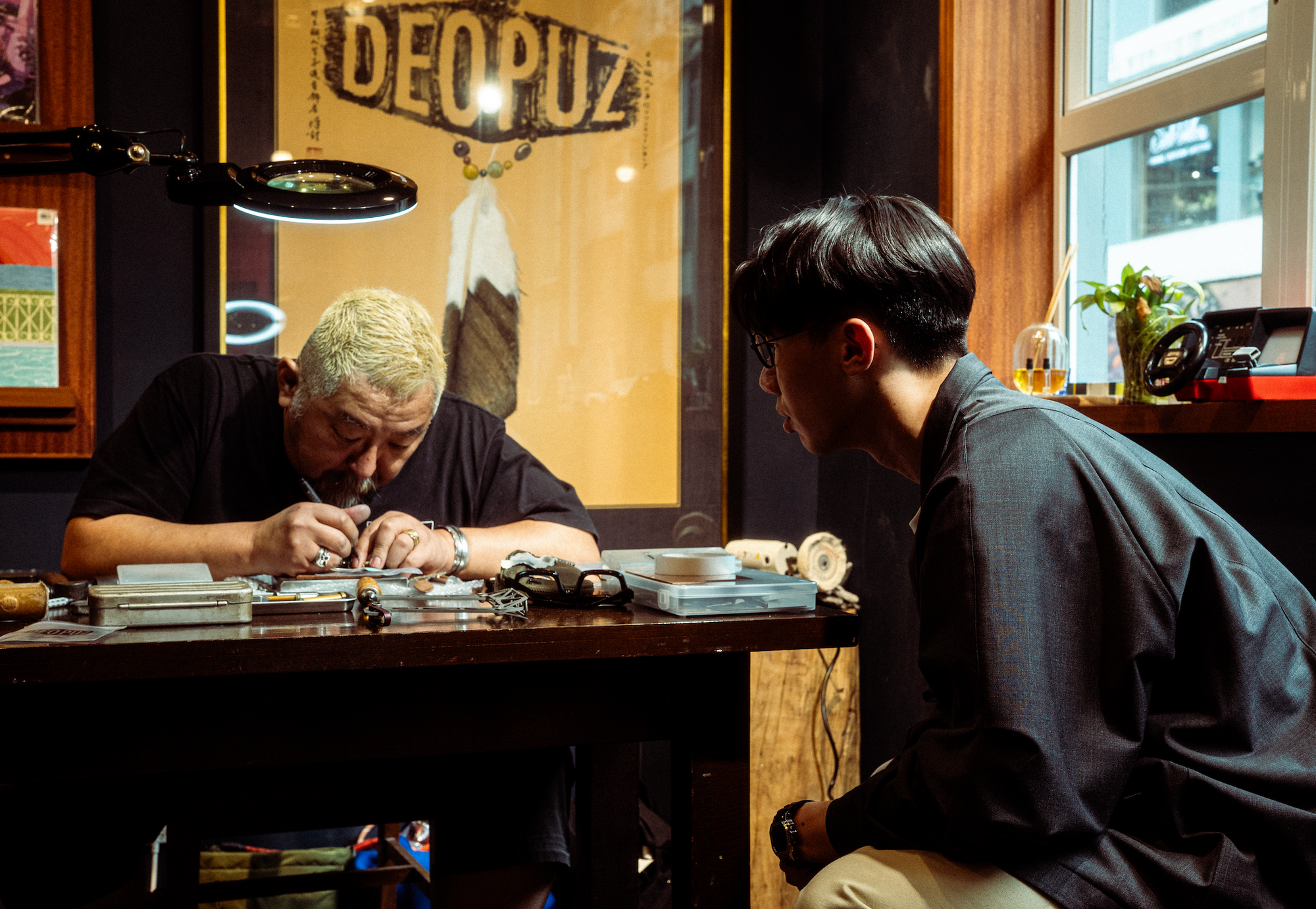 Sunshine Studio artisan demonstrating handmade silver jewellery techniques