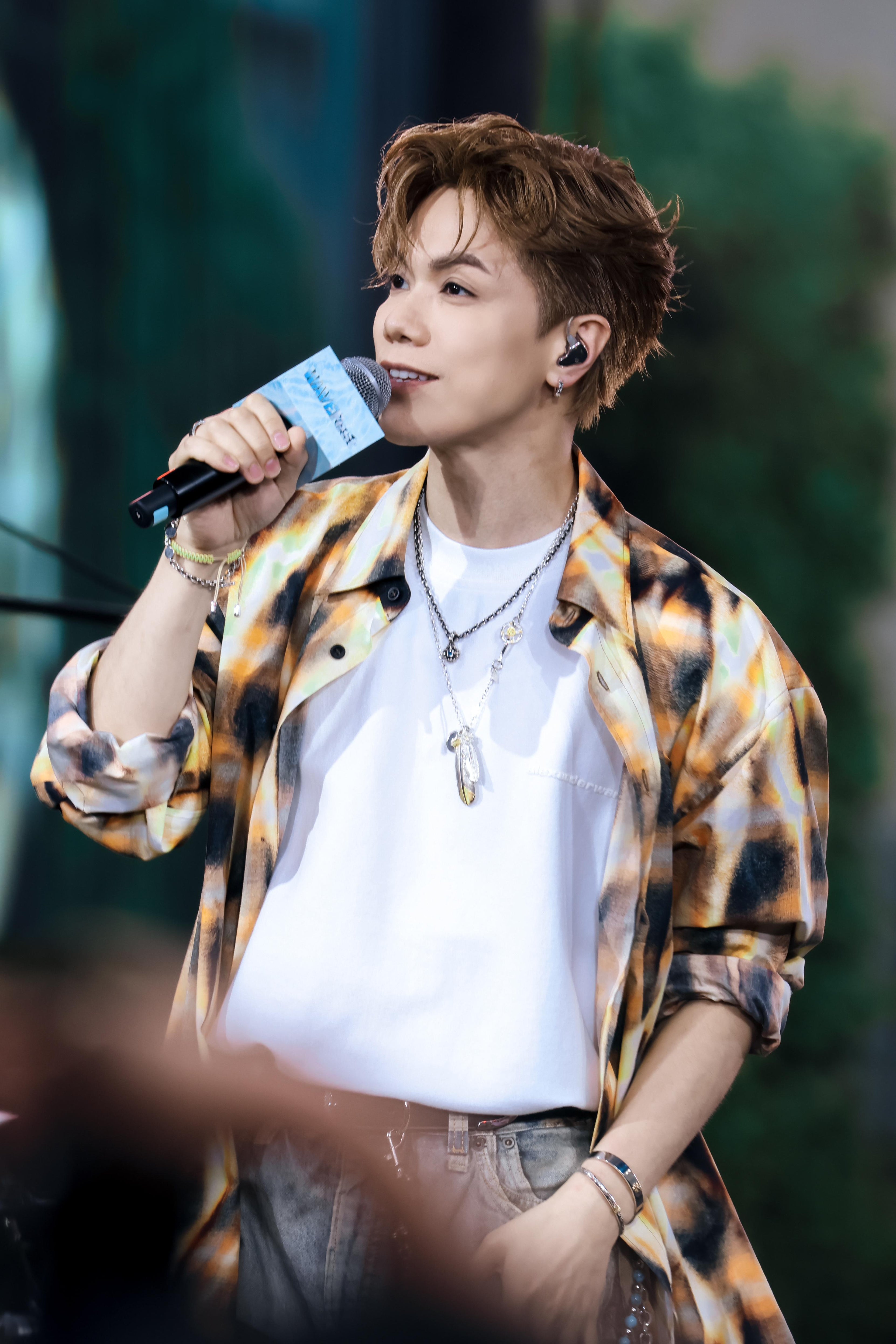 Sunshine Studio silver feather jewellery styled on HIN'S Cheung