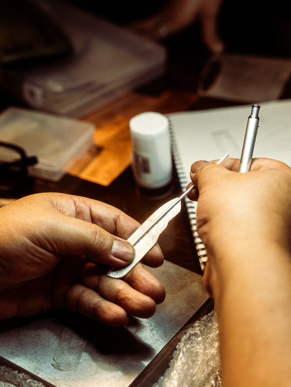Sunshine Studio artisan demonstrating handmade silver jewellery techniques